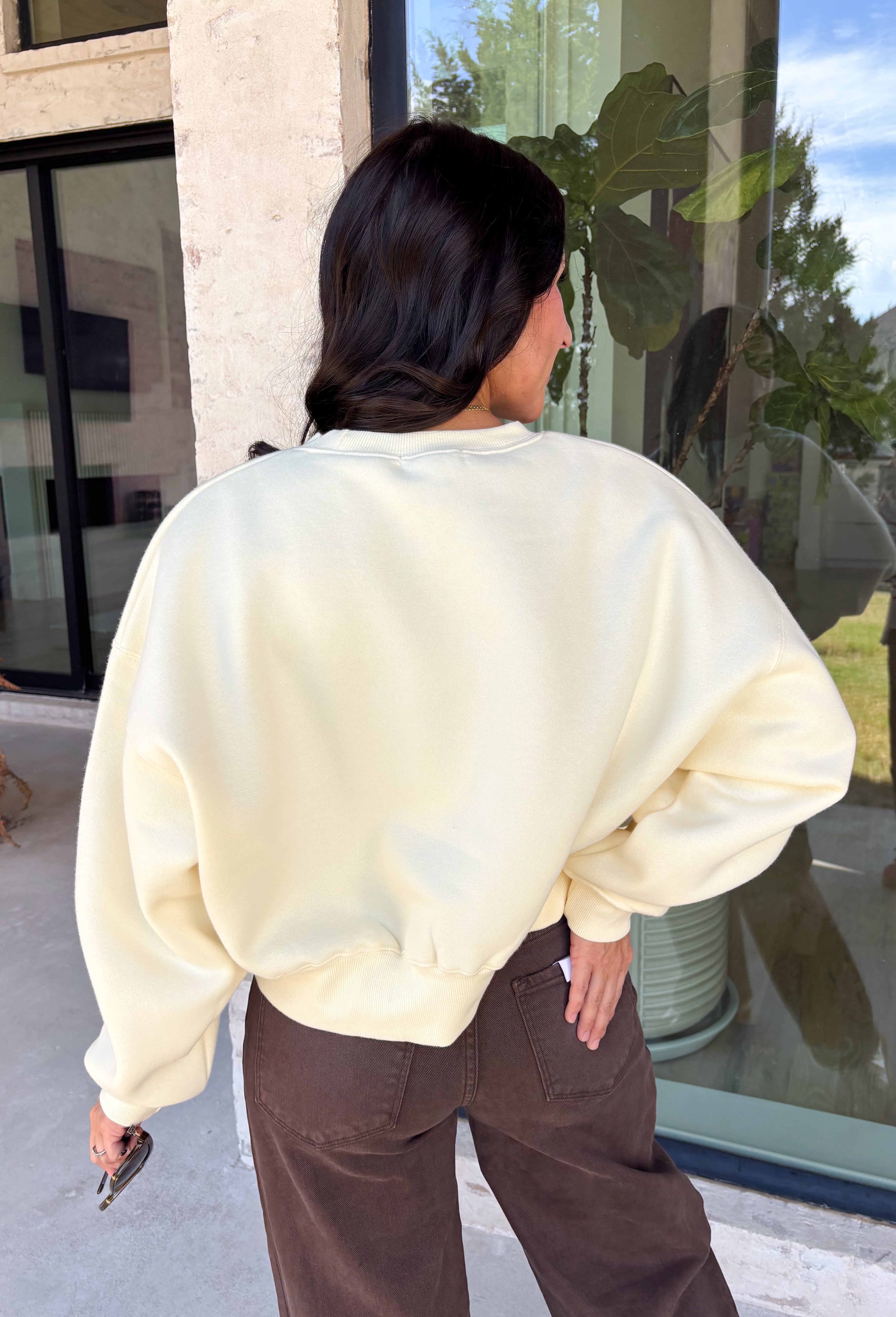 Stay cozy while showing off your love for the outdoors with this fun graphic sweatshirt from Poppy &amp; Pine. Designed in a classic white hue, this fleece-lined pullover features a charming mallard duck graphic across the front for the perfect blend of playful style and everyday comfort. The ultra-soft interior keeps you warm on crisp fall days, while the ribbed neckline, cuffs, and hem create a timeless fit you'll love.