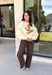 Stay cozy while showing off your love for the outdoors with this fun graphic sweatshirt from Poppy &amp; Pine. Designed in a classic white hue, this fleece-lined pullover features a charming mallard duck graphic across the front for the perfect blend of playful style and everyday comfort. The ultra-soft interior keeps you warm on crisp fall days, while the ribbed neckline, cuffs, and hem create a timeless fit you'll love.