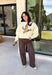 Stay cozy while showing off your love for the outdoors with this fun graphic sweatshirt from Poppy &amp; Pine. Designed in a classic white hue, this fleece-lined pullover features a charming mallard duck graphic across the front for the perfect blend of playful style and everyday comfort. The ultra-soft interior keeps you warm on crisp fall days, while the ribbed neckline, cuffs, and hem create a timeless fit you'll love.