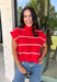 Bring timeless style and cozy comfort to your fall wardrobe with this classic sweater from Day + Moon. Designed in a vibrant red knit with crisp white stripes, this short sleeve sweater is the perfect blend of polished and playful. The cozy turtleneck adds warmth for cooler days, while the soft knit fabric makes it comfortable enough for all-day wear. Whether you're headed to work, a football game, or a weekend coffee date, this versatile sweater is an easy favorite for the season.