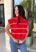 Bring timeless style and cozy comfort to your fall wardrobe with this classic sweater from Day + Moon. Designed in a vibrant red knit with crisp white stripes, this short sleeve sweater is the perfect blend of polished and playful. The cozy turtleneck adds warmth for cooler days, while the soft knit fabric makes it comfortable enough for all-day wear. Whether you're headed to work, a football game, or a weekend coffee date, this versatile sweater is an easy favorite for the season.