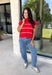 Bring timeless style and cozy comfort to your fall wardrobe with this classic sweater from Day + Moon. Designed in a vibrant red knit with crisp white stripes, this short sleeve sweater is the perfect blend of polished and playful. The cozy turtleneck adds warmth for cooler days, while the soft knit fabric makes it comfortable enough for all-day wear. Whether you're headed to work, a football game, or a weekend coffee date, this versatile sweater is an easy favorite for the season.