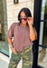 The perfect layering piece has arrived just in time for sweater weather. This chocolate brown cardigan is crafted from a soft sweater knit that makes every outfit feel a little cozier while still looking effortlessly polished. The button-front design gives you endless styling options—wear it buttoned as a top or layered over your favorite tanks and dresses. Finished with exposed hems and classic ribbed trim, this versatile cardigan is one you'll reach for from crisp fall mornings through the holiday season.