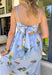 This light blue sleeveless dress is pure springtime sweetness! With a floral print sprinkled throughout, it feels fresh, feminine, and perfect for sunny days ahead. The scalloped neckline and matching scalloped hem add the prettiest little detail that makes this dress feel extra special. The adjustable straps let you customize the fit, and the elastic back with a self-tie detail keeps it comfy while giving you a flattering shape. Fully lined for coverage and finished with side pockets.