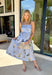 This light blue sleeveless dress is pure springtime sweetness! With a floral print sprinkled throughout, it feels fresh, feminine, and perfect for sunny days ahead. The scalloped neckline and matching scalloped hem add the prettiest little detail that makes this dress feel extra special. The adjustable straps let you customize the fit, and the elastic back with a self-tie detail keeps it comfy while giving you a flattering shape. Fully lined for coverage and finished with side pockets.