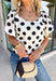 This off white polka dot top is the perfect blend of timeless and on-trend! The classic black polka dot print never goes out of style, while the statement sleeves add a fashion-forward touch that instantly elevates your look. Crafted from breathable cotton, it's lightweight enough to wear now and easy to layer under jackets and cardigans as the seasons change. Whether you're heading to the office, meeting friends for lunch, or dressing up your favorite denim, this top makes looking polished feel effortless.