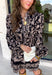 Chic, timeless, and effortlessly feminine, this floral dress is made for every special moment on your fall calendar. Featuring a classic black backdrop with a beautiful tan and off-white floral print, this dress offers a sophisticated look that's easy to wear from day to night. The button-front bodice, long sleeves, and tiered skirt create a flattering silhouette with graceful movement, while the elastic cuffs add a comfortable finishing touch. 