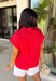 Bold, feminine, and perfect for sunny days! This red short sleeve button down top features beautiful eyelet lace throughout, adding texture and charm to a classic silhouette. The vibrant color makes it an instant standout while the breathable cotton fabric keeps it comfortable and easy to wear. Designed with a collared neckline and full button front, this top blends timeless structure with delicate detail. It’s polished enough to dress up but still relaxed enough for everyday styling.