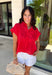 Bold, feminine, and perfect for sunny days! This red short sleeve button down top features beautiful eyelet lace throughout, adding texture and charm to a classic silhouette. The vibrant color makes it an instant standout while the breathable cotton fabric keeps it comfortable and easy to wear. Designed with a collared neckline and full button front, this top blends timeless structure with delicate detail. It’s polished enough to dress up but still relaxed enough for everyday styling.
