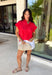 Bold, feminine, and perfect for sunny days! This red short sleeve button down top features beautiful eyelet lace throughout, adding texture and charm to a classic silhouette. The vibrant color makes it an instant standout while the breathable cotton fabric keeps it comfortable and easy to wear. Designed with a collared neckline and full button front, this top blends timeless structure with delicate detail. It’s polished enough to dress up but still relaxed enough for everyday styling.