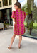 Make a statement this season in this beautifully detailed dress from Entro. Featuring a unique mix of stripes and polka dots in rich shades of plum, burgundy, and olive, this eye-catching dress is full of playful charm with a timeless feel. The flattering v-neckline is accented with decorative front button details, while contrast trim adds an extra touch of personality. 