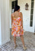 Make an entrance in this bold abstract print dress that was made for sunny days and standout moments. With vibrant shades of orange, pink, tan, black, yellow, and white throughout, this sleeveless beauty feels like wearable art. The orange scallop trim along the neckline and pink scallop trim at the hem add the sweetest contrast, giving it that extra pop of personality. Lightweight and fully lined for easy wear.