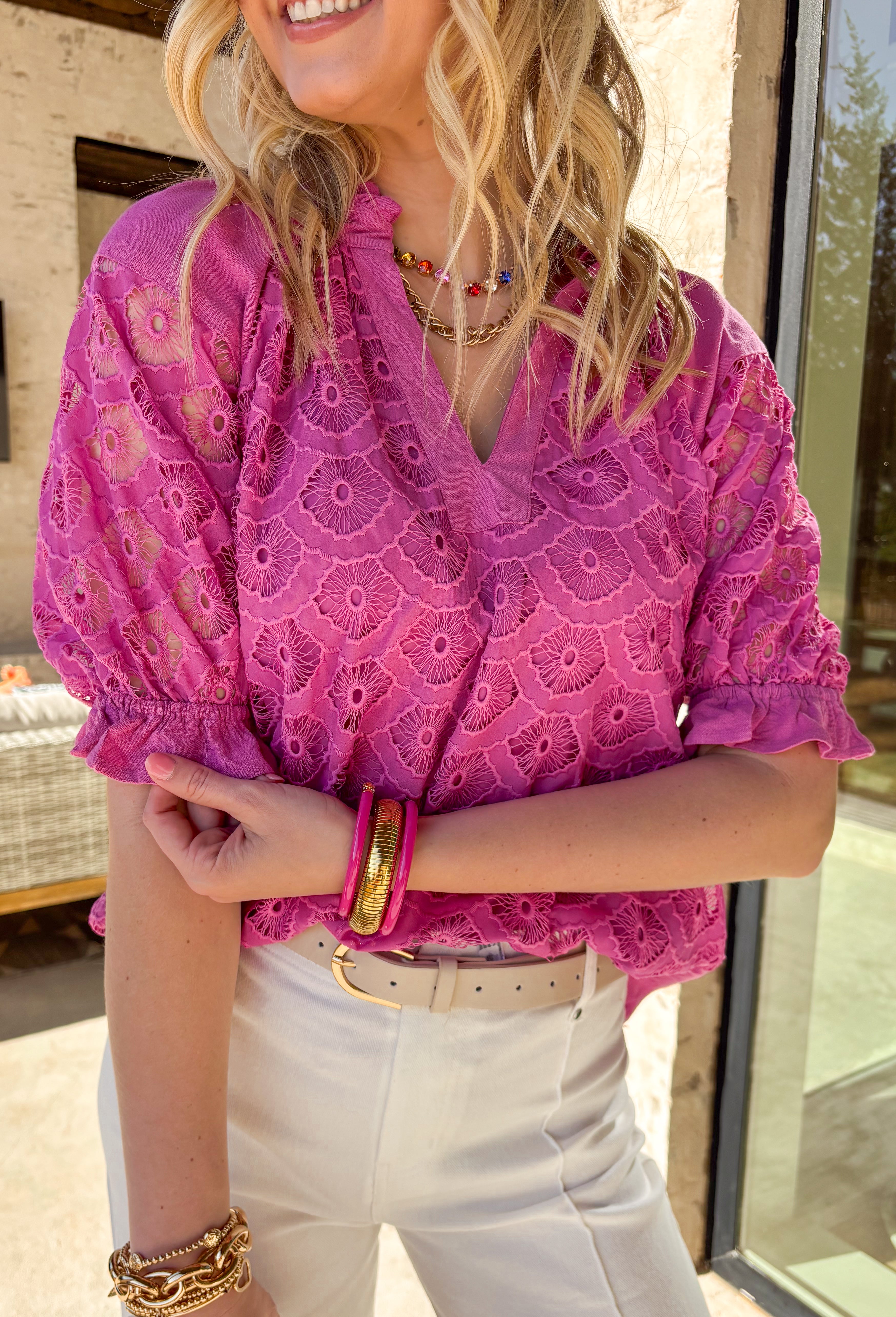 This pink peony lace top is the definition of sweet spring style! Featuring a gorgeous lace overlay across the front and sleeves, it brings the perfect amount of feminine texture while still feeling light and effortless. The flattering v-neckline is finished with a subtle ruffle trim for an extra-pretty touch, and the elastic ruffle sleeves give it that easy, comfy fit you’ll want to wear on repeat. Pair it with denim, white jeans, or a flowy skirt and you’re instantly ready for all the sunshine plans.