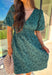 This green short sleeve dress by She + Sky brings an elegant touch to your wardrobe with its monochromatic floral texture that gives a lace-like look—perfect for the holiday season. The puff sleeves and elastic waist create a flattering, feminine silhouette, while the fully lined design ensures comfort from dinner parties to festive gatherings. It’s a chic, effortless piece you’ll reach for all winter long.