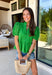 This green eyelet top is such a fresh and feminine pick for summer! The intricate eyelet embroidery adds the prettiest texture, while the puff sleeves and elastic openings create that flattering, easy shape. The ruffled neckline with a soft v-neck adds a touch of charm, and the scalloped hem gives it that extra detail that makes it feel special. Lightweight and breathable in 100% cotton, it’s perfect for warm days when you want to look put together without overthinking it. 