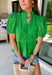 This green eyelet top is such a fresh and feminine pick for summer! The intricate eyelet embroidery adds the prettiest texture, while the puff sleeves and elastic openings create that flattering, easy shape. The ruffled neckline with a soft v-neck adds a touch of charm, and the scalloped hem gives it that extra detail that makes it feel special. Lightweight and breathable in 100% cotton, it’s perfect for warm days when you want to look put together without overthinking it. 
