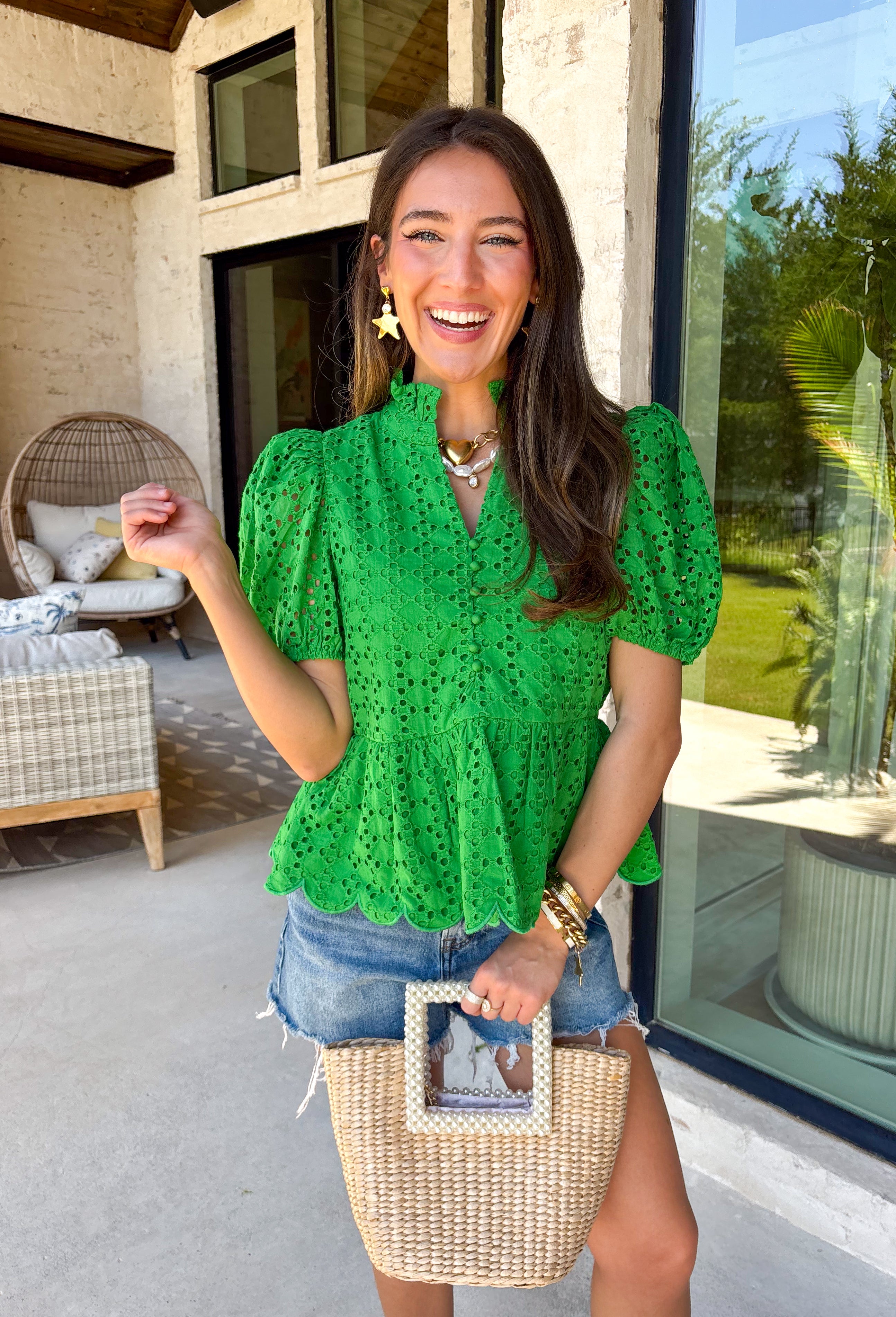 This green eyelet top is such a fresh and feminine pick for summer! The intricate eyelet embroidery adds the prettiest texture, while the puff sleeves and elastic openings create that flattering, easy shape. The ruffled neckline with a soft v-neck adds a touch of charm, and the scalloped hem gives it that extra detail that makes it feel special. Lightweight and breathable in 100% cotton, it’s perfect for warm days when you want to look put together without overthinking it. 