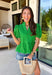 This green eyelet top is such a fresh and feminine pick for summer! The intricate eyelet embroidery adds the prettiest texture, while the puff sleeves and elastic openings create that flattering, easy shape. The ruffled neckline with a soft v-neck adds a touch of charm, and the scalloped hem gives it that extra detail that makes it feel special. Lightweight and breathable in 100% cotton, it’s perfect for warm days when you want to look put together without overthinking it. 