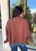 Stay cozy in effortless style with this timeless sweater from Twentifourth. Designed in a rich chocolate brown hue, this lightweight knit is the perfect layering piece for crisp fall mornings and cool evenings. The mock neckline adds a touch of warmth, while the exposed seam detailing gives this classic sweater a modern, lived-in look. Soft, comfortable, and easy to style, it's a versatile staple you'll find yourself reaching for all season long.