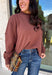 Stay cozy in effortless style with this timeless sweater from Twentifourth. Designed in a rich chocolate brown hue, this lightweight knit is the perfect layering piece for crisp fall mornings and cool evenings. The mock neckline adds a touch of warmth, while the exposed seam detailing gives this classic sweater a modern, lived-in look. Soft, comfortable, and easy to style, it's a versatile staple you'll find yourself reaching for all season long.