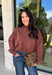 Stay cozy in effortless style with this timeless sweater from Twentifourth. Designed in a rich chocolate brown hue, this lightweight knit is the perfect layering piece for crisp fall mornings and cool evenings. The mock neckline adds a touch of warmth, while the exposed seam detailing gives this classic sweater a modern, lived-in look. Soft, comfortable, and easy to style, it's a versatile staple you'll find yourself reaching for all season long.