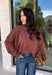 Stay cozy in effortless style with this timeless sweater from Twentifourth. Designed in a rich chocolate brown hue, this lightweight knit is the perfect layering piece for crisp fall mornings and cool evenings. The mock neckline adds a touch of warmth, while the exposed seam detailing gives this classic sweater a modern, lived-in look. Soft, comfortable, and easy to style, it's a versatile staple you'll find yourself reaching for all season long.