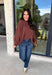 Stay cozy in effortless style with this timeless sweater from Twentifourth. Designed in a rich chocolate brown hue, this lightweight knit is the perfect layering piece for crisp fall mornings and cool evenings. The mock neckline adds a touch of warmth, while the exposed seam detailing gives this classic sweater a modern, lived-in look. Soft, comfortable, and easy to style, it's a versatile staple you'll find yourself reaching for all season long.