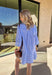Bright, cheerful, and perfect for spring days, this blue and white striped long sleeve dress brings an easy, sunshine-filled feel to your wardrobe. The classic stripe pattern feels fresh and timeless, while the button-down design with a crisp white band and collared neckline adds a polished touch. Fully lined for comfortable wear, this dress is an effortless option for brunch, daytime events, or spring outings.