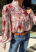 Bring a touch of winter romance to your wardrobe with this mauve floral button-down top by Fate. Featuring shades of pink, burgundy, gray, and orange, the floral print adds a warm pop of color against the chilly season. The ruffled neckline and cuffs give it a soft, feminine finish—perfect for dressing up denim or layering under a structured jacket all winter long.