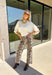 A timeless sweater is a staple every wardrobe needs, and this classic knit from Hyfve is one you'll wear season after season. Designed in a versatile cream hue, this cozy short sleeve sweater offers endless styling possibilities. The simple silhouette makes it easy to pair with everything from your favorite denim to tailored trousers, while the soft knit keeps you comfortable throughout the day. 