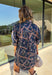 Denim gets a colorful fall refresh with this printed dress from Entro. The denim fabric is covered in a beautiful floral print featuring shades of autumn, giving a classic favorite a fun seasonal twist. A collared neckline and button-front closure bring in that timeless shirt dress feel, while long sleeves make it an easy choice as cooler weather rolls in. Convenient side pockets add an everyday touch, and the cotton-blend fabric has just a hint of stretch for comfortable wear. 