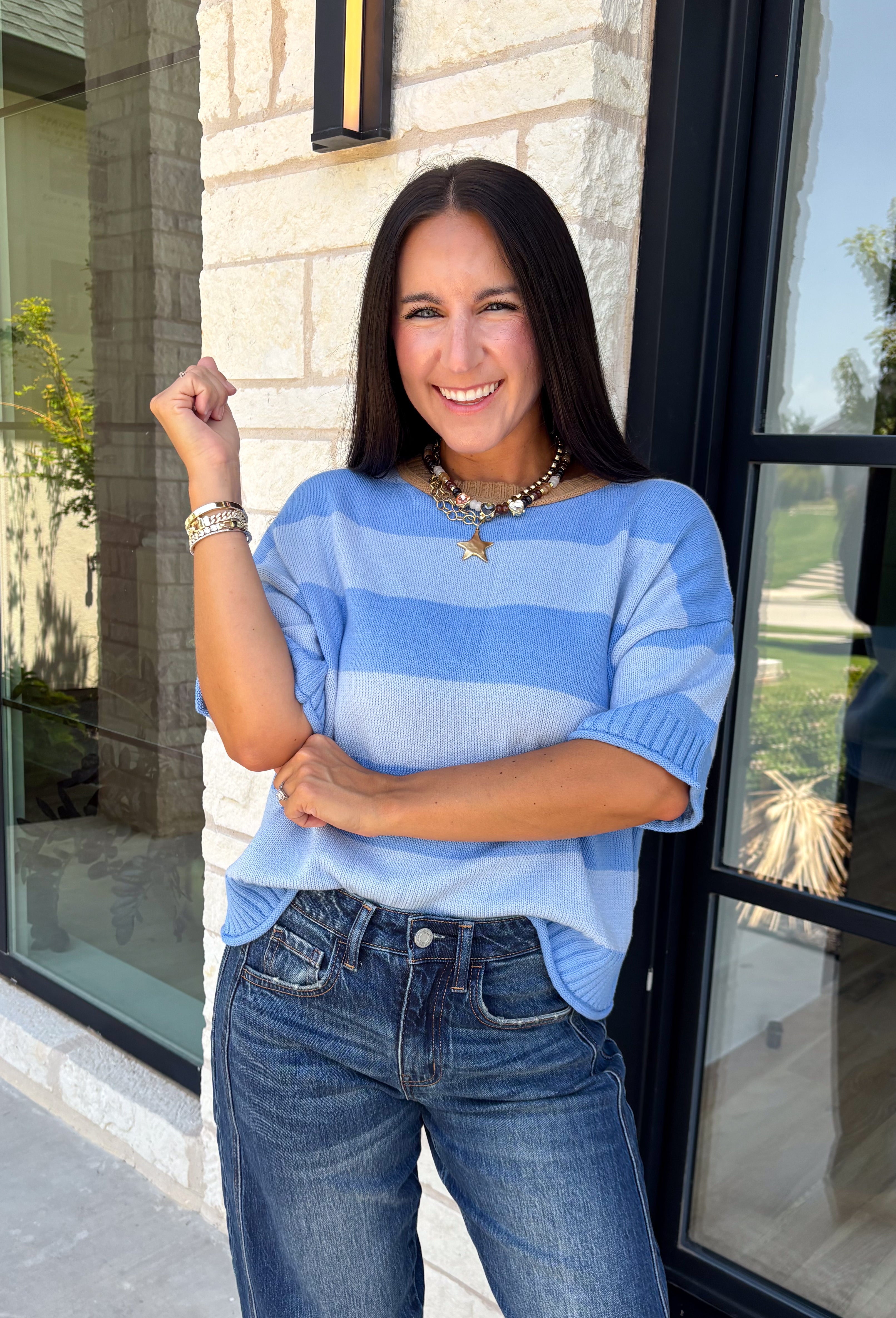 Soft, cozy, and effortlessly classic, this striped sweater is the perfect piece for transitioning into fall! Featuring light blue stripes with warm tan trim along the neckline, this knit blends timeless style with a fresh seasonal color palette. Ribbed detailing at the sleeves and hem adds a polished finish, while the breathable cotton blend keeps it comfortable for layering or wearing on its own. 