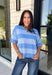 Soft, cozy, and effortlessly classic, this striped sweater is the perfect piece for transitioning into fall! Featuring light blue stripes with warm tan trim along the neckline, this knit blends timeless style with a fresh seasonal color palette. Ribbed detailing at the sleeves and hem adds a polished finish, while the breathable cotton blend keeps it comfortable for layering or wearing on its own. 