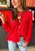Bright, lightweight, and perfect for spring layering, this red knit button-down cardigan by Wishlist is an easy way to add a pop of color to any outfit. The soft, lightweight knit makes it ideal for tossing on during cool mornings or breezy evenings, while the classic button-down design keeps it timeless and versatile. Wear it buttoned up as a top or layered over a tank for effortless spring styling.