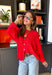 Bright, lightweight, and perfect for spring layering, this red knit button-down cardigan by Wishlist is an easy way to add a pop of color to any outfit. The soft, lightweight knit makes it ideal for tossing on during cool mornings or breezy evenings, while the classic button-down design keeps it timeless and versatile. Wear it buttoned up as a top or layered over a tank for effortless spring styling.