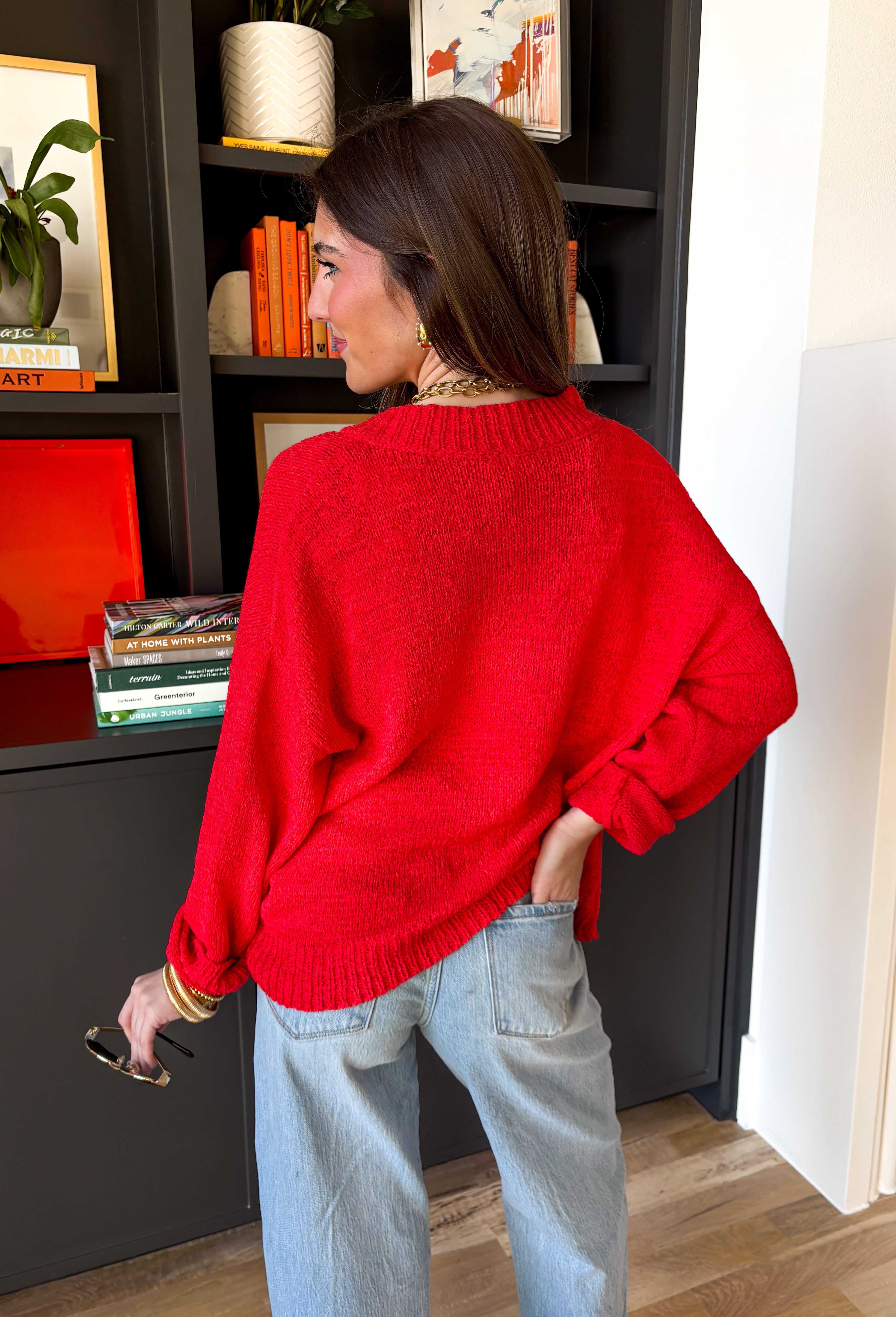 Bright, lightweight, and perfect for spring layering, this red knit button-down cardigan by Wishlist is an easy way to add a pop of color to any outfit. The soft, lightweight knit makes it ideal for tossing on during cool mornings or breezy evenings, while the classic button-down design keeps it timeless and versatile. Wear it buttoned up as a top or layered over a tank for effortless spring styling.