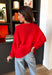 Bright, lightweight, and perfect for spring layering, this red knit button-down cardigan by Wishlist is an easy way to add a pop of color to any outfit. The soft, lightweight knit makes it ideal for tossing on during cool mornings or breezy evenings, while the classic button-down design keeps it timeless and versatile. Wear it buttoned up as a top or layered over a tank for effortless spring styling.