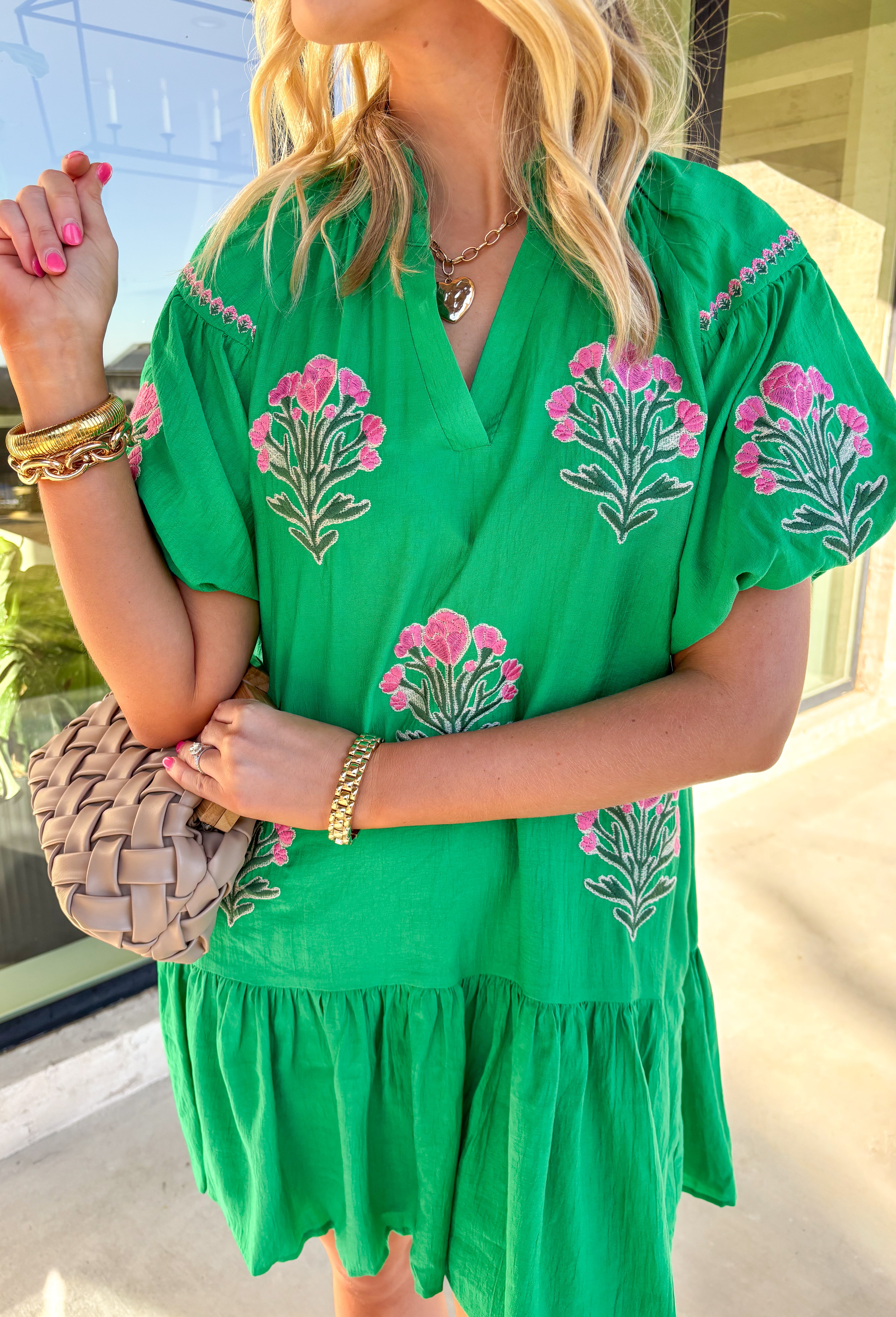 Cue the compliments—this kelly green dress is springtime perfection! Featuring puff sleeves, a subtle ruffle neckline, and bold pink embroidered florals (with extra dainty details along the sleeves!), it’s as sweet as can be. Fully lined and made from 100% cotton by Umgee, this dress is light, breathable, and ready to twirl through brunches, baby showers, or your next sunny day adventure.