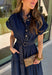 There’s something about a great denim dress that makes getting dressed feel instantly easier. This dark wash midi dress from Entro features a stand collar and partial gold button front that adds a polished touch to the classic denim look. Cap sleeves keep the silhouette easy to layer as the seasons change, while the coordinating self-tie belt lets you add definition at the waist. Finished with convenient side pockets, this versatile dress can take you from casual office days and lunch plans to football week