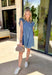 This soft denim dress is giving effortless spring charm in the best way! With pinstripes throughout, a sweet ruffle neckline, and fluttery ruffle sleeves, it’s the kind of throw-on-and-go piece that still looks totally put together. The frayed hem adds a little laid-back edge, while the side pockets make it even more wearable for everyday plans. Perfect for farmers markets, casual Fridays, or those sunny afternoons when you want to feel cute without trying too hard.