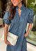 Classic stripes and feminine details make this midi dress an effortless favorite for the season. Featuring rich hunter green and soft blue stripes, this beautifully crafted cotton dress brings timeless style with a fresh autumn feel. The ruffled neckline and puff sleeves add a romantic touch, while the button-front design and flowy ruffle hem create an easy, flattering silhouette.