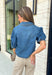 Every closet deserves a classic denim top, and this one is made to be worn on repeat! Crafted from soft medium wash denim, this timeless button-down top is an effortless staple for every season. The collared neckline gives it a polished feel, while the puff sleeves add just the right amount of feminine charm. This versatile top is one you'll reach for year after year!