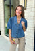 Every closet deserves a classic denim top, and this one is made to be worn on repeat! Crafted from soft medium wash denim, this timeless button-down top is an effortless staple for every season. The collared neckline gives it a polished feel, while the puff sleeves add just the right amount of feminine charm. This versatile top is one you'll reach for year after year!