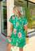 This green floral dress is the easiest way to bring a little spring color into your day! Covered in a cheerful mix it’s bright, fun, and still super wearable thanks to the classic black background. The navy and white trim along the front and sleeve cuffs adds a sporty-chic touch, while the side pockets make it even more of a win (because we love a cute dress that’s also practical). Just add sandals or sneakers and you’re ready for anything from weekend plans to casual dinners.