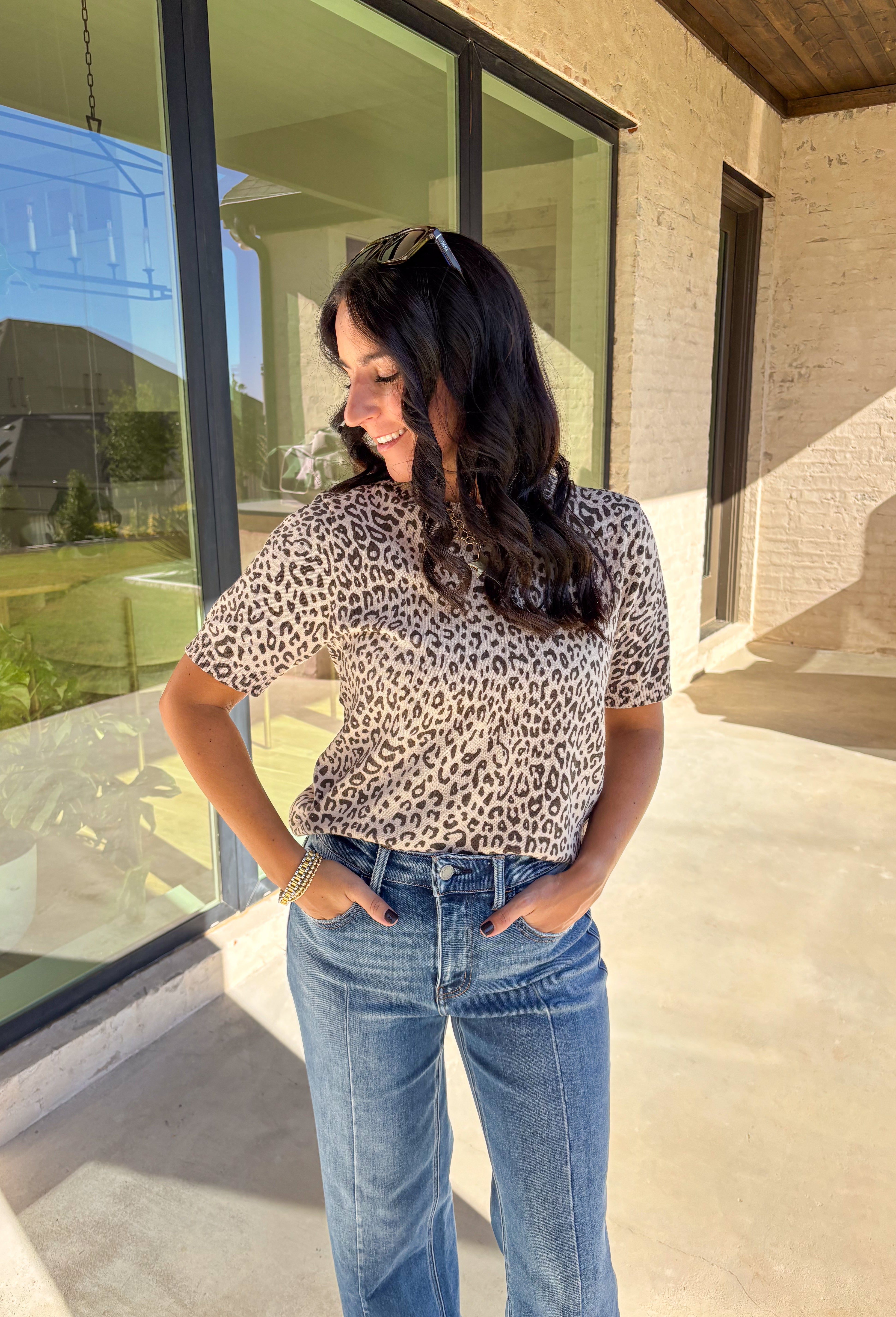 This taupe lightweight knit sweater by Fate brings effortless style to your fall wardrobe. Designed with a black leopard print, it adds a playful touch while keeping things easy and chic. The short sleeves and ribbed hem, neckline, and sleeves give it a polished finish, making it perfect for layering or wearing solo on those in-between days.