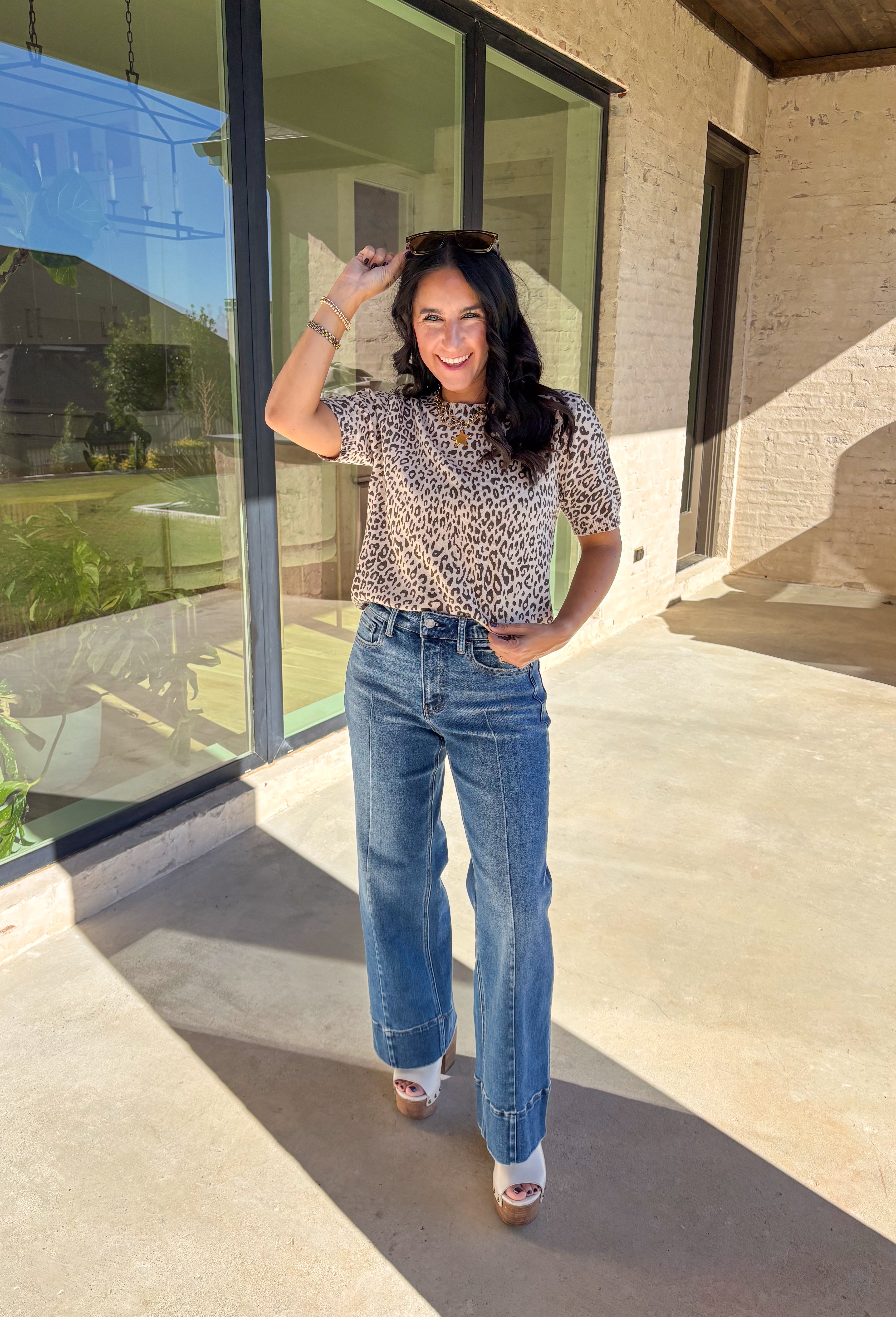 This taupe lightweight knit sweater by Fate brings effortless style to your fall wardrobe. Designed with a black leopard print, it adds a playful touch while keeping things easy and chic. The short sleeves and ribbed hem, neckline, and sleeves give it a polished finish, making it perfect for layering or wearing solo on those in-between days.