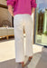 Freshen up your spring wardrobe with these high-waisted off white wide leg jeans by Entro. Designed with an exposed seam detail down the front, these jeans bring a modern twist to a timeless silhouette. The soft cotton blend and touch of stretch make them comfortable for all-day wear—perfect for pairing with lightweight blouses or colorful spring knits.