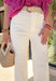 Freshen up your spring wardrobe with these high-waisted off white wide leg jeans by Entro. Designed with an exposed seam detail down the front, these jeans bring a modern twist to a timeless silhouette. The soft cotton blend and touch of stretch make them comfortable for all-day wear—perfect for pairing with lightweight blouses or colorful spring knits.