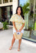 This neutral floral top is such a bright and easy pick for summer days! The soft yellow floral print with subtle pops of green gives it that fresh, feel-good look that’s perfect for the season. The smocked elastic waist creates a flattering shape while still keeping things comfortable and easy to wear. Finished with a v-neckline, it has that effortless, feminine feel you’ll reach for again and again. Lightweight and breathable in cotton, it’s perfect for everything from errands to lunch plans. 