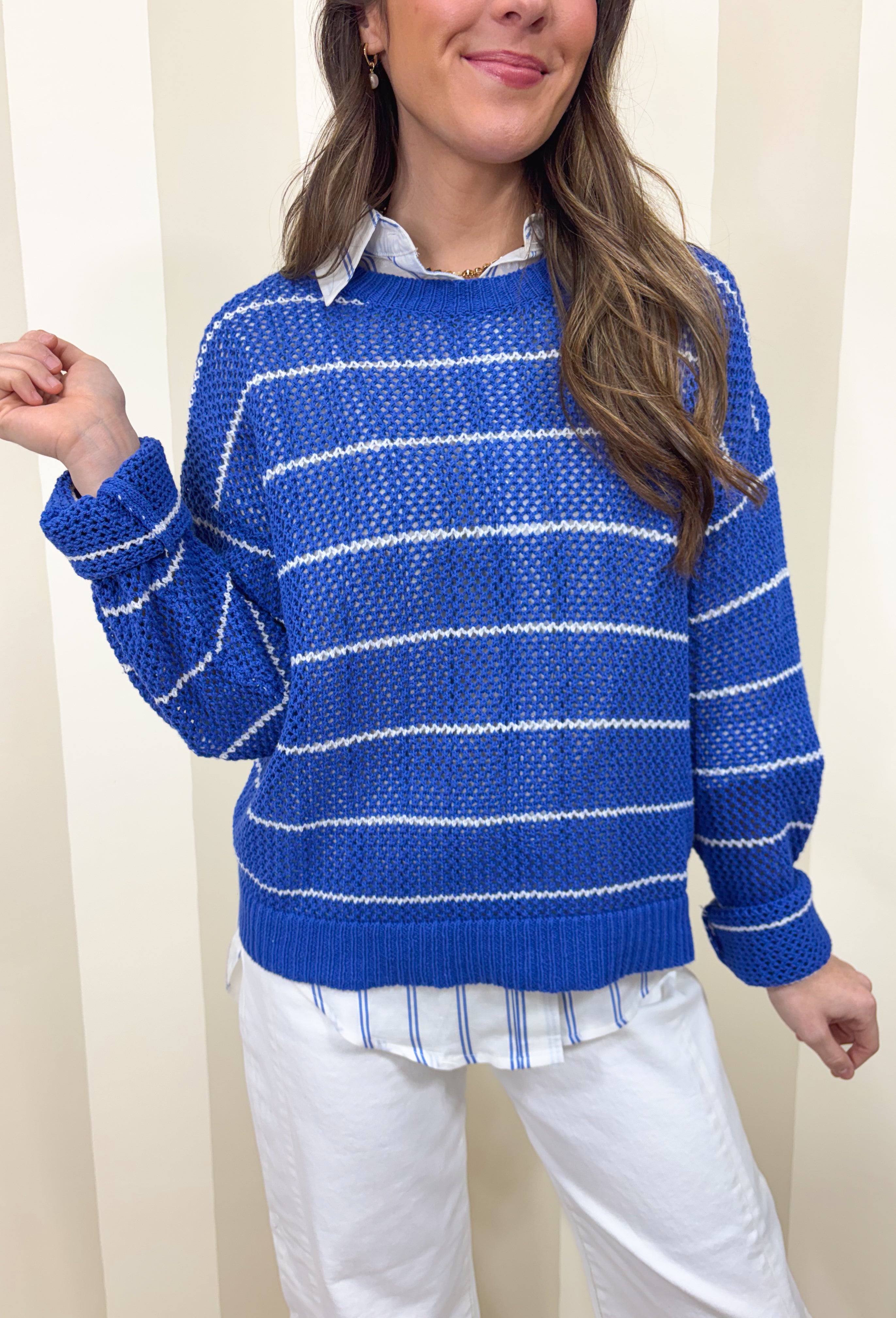 Lightweight, breezy, and perfect for spring layering, this blue and white striped open knit sweater by Wishlist is an easy warm-weather staple. The open knit design keeps it airy and relaxed, making it perfect for tossing on over a tank or bralette on sunny days. With timeless stripes and a soft knit feel, this sweater gives effortless coastal vibes—whether you’re headed to brunch, the beach, or just want something cute and comfy for everyday.